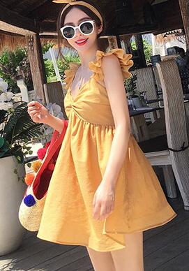 厌倦了短袖T恤的繁杂搭配 让连衣裙来解放你