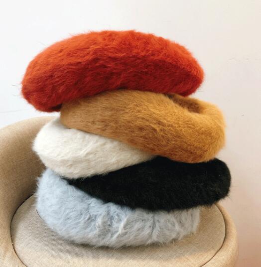 冬季穿大衣是很适合搭配帽子 推荐几款适合大衣的帽子