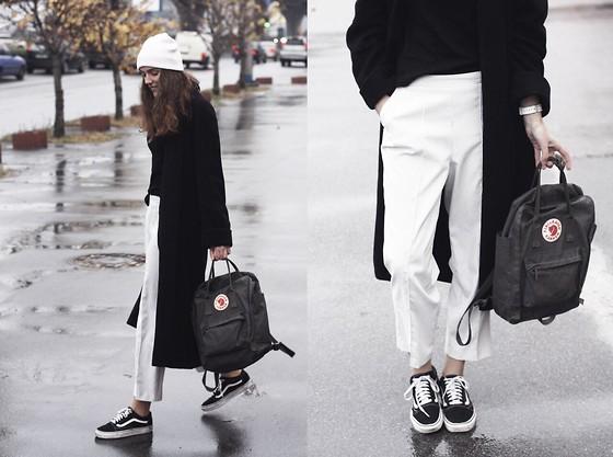 温度风度两不误 只需一件及踝大衣