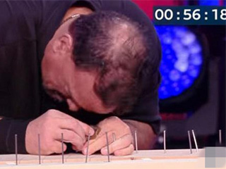 男子用脑袋钉钉子创纪录 网友：铁头功重现江湖难逢敌手